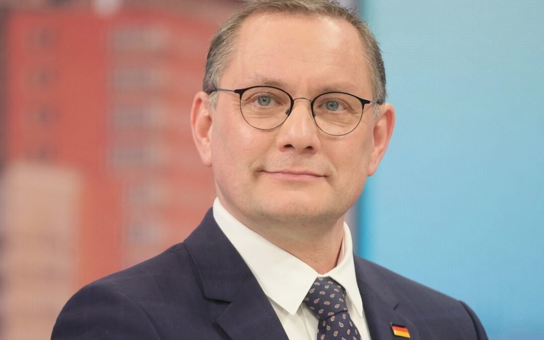 Tino Chrupalla portrait with German flag pin
