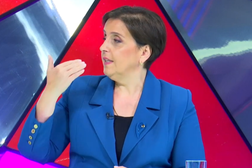 Eliso Kiladze in blue jacket during TV appearance