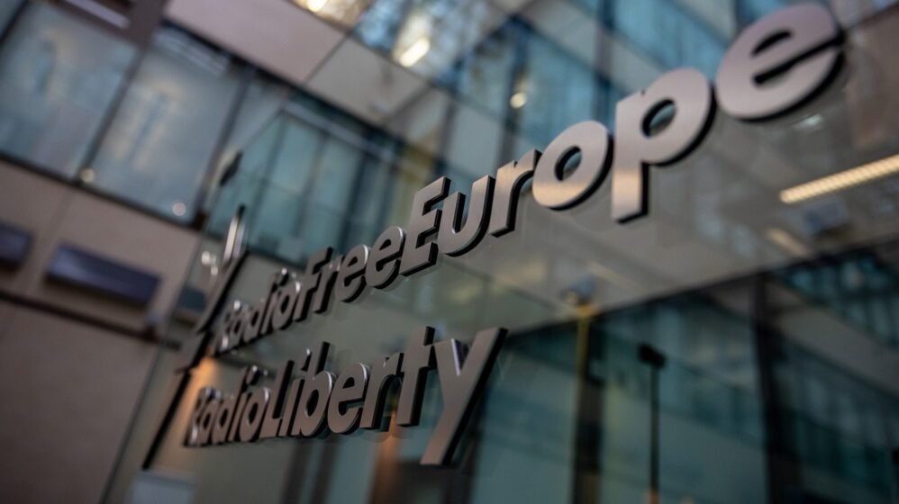 The Radio Free Europe/Radio Liberty sign is displayed at its headquarters in Prague, Czech Republic, 27 March 2025. EPA/MARTIN DIVISEK