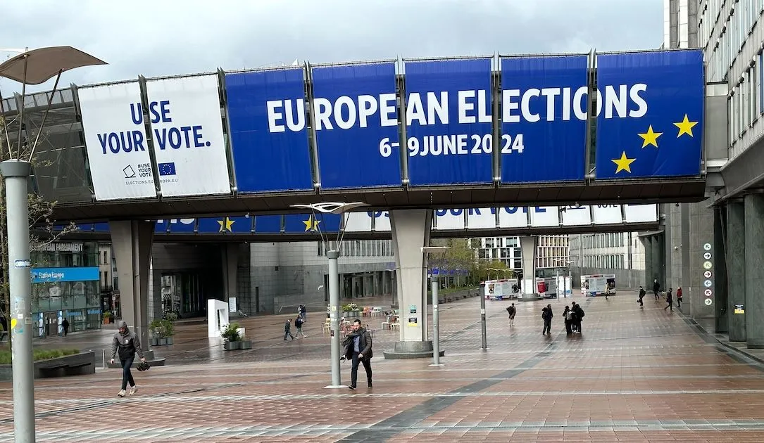 European Elections banner at EU Parliament plaza in Brussels with 'Use Your Vote' campaign
