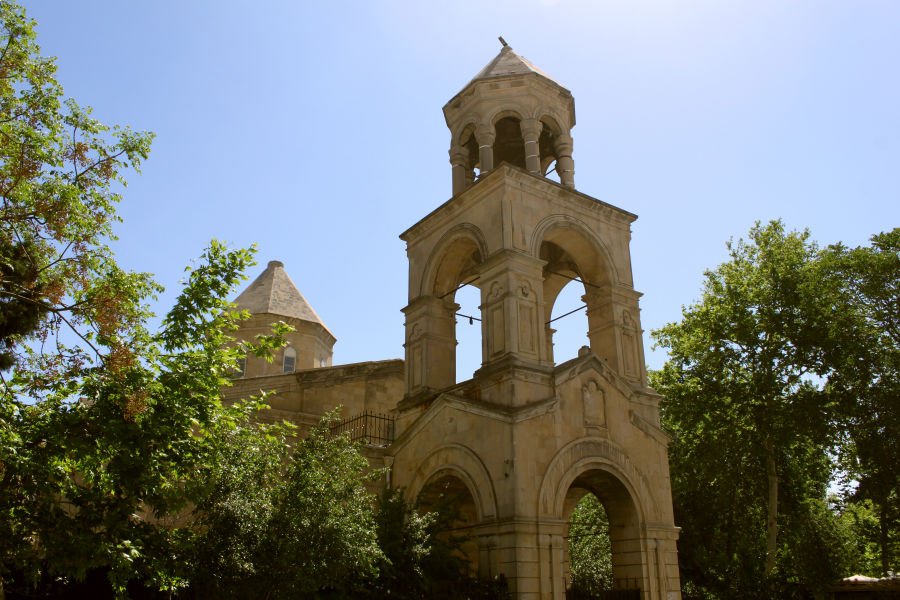 Historic Armenian church architecture with bell tower