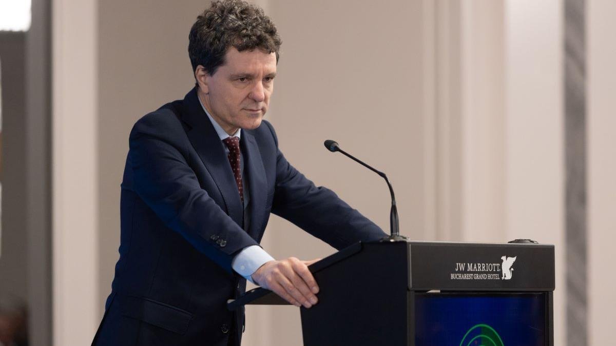 Nicușor Dan at podium during official event at JW Marriott Bucharest Grand Hotel