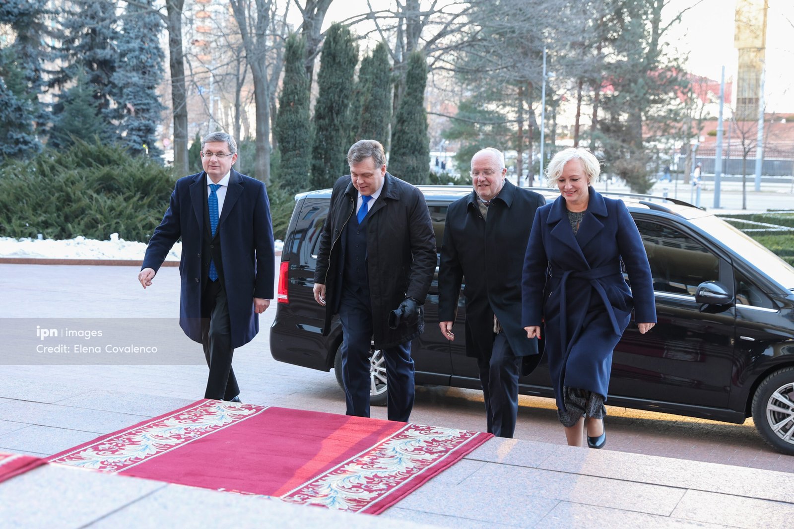 Baltic parliamentary delegation arriving at venue, walking on red carpet