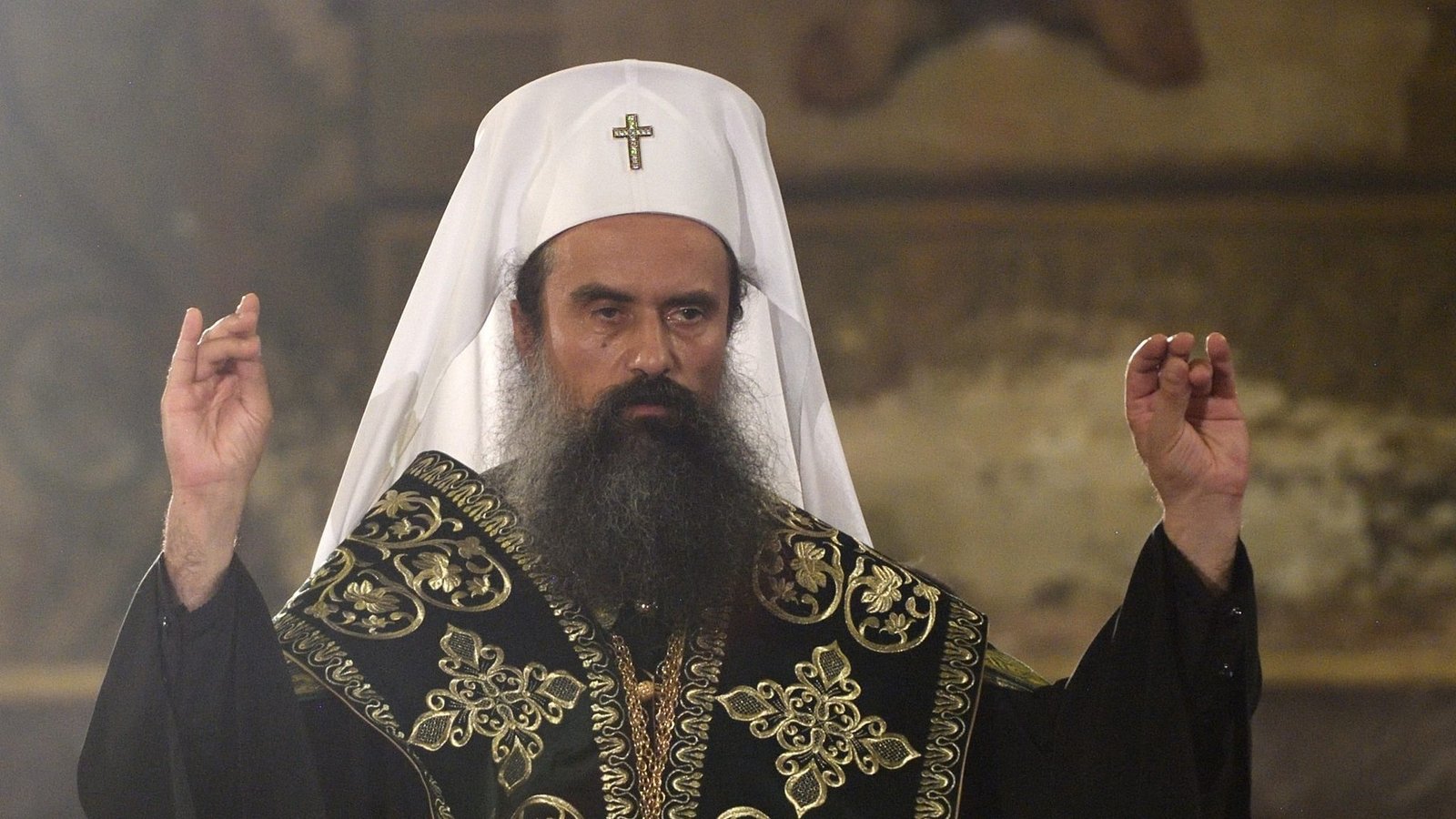 Bulgarian Patriarch in traditional Orthodox vestments with white klobuk and cross