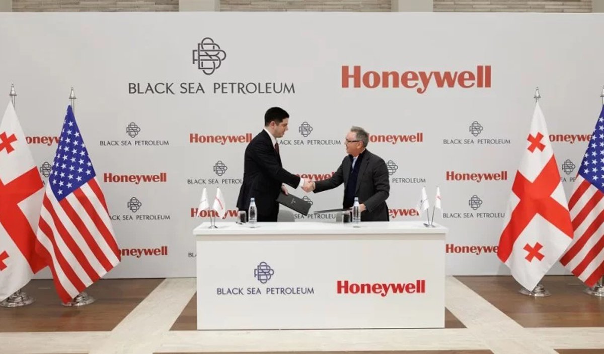 Black Sea Petroleum and Honeywell signing ceremony with Georgian and US flags