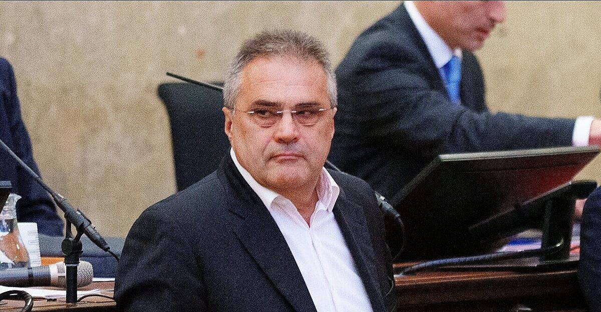 Egisto Ott in courtroom during trial