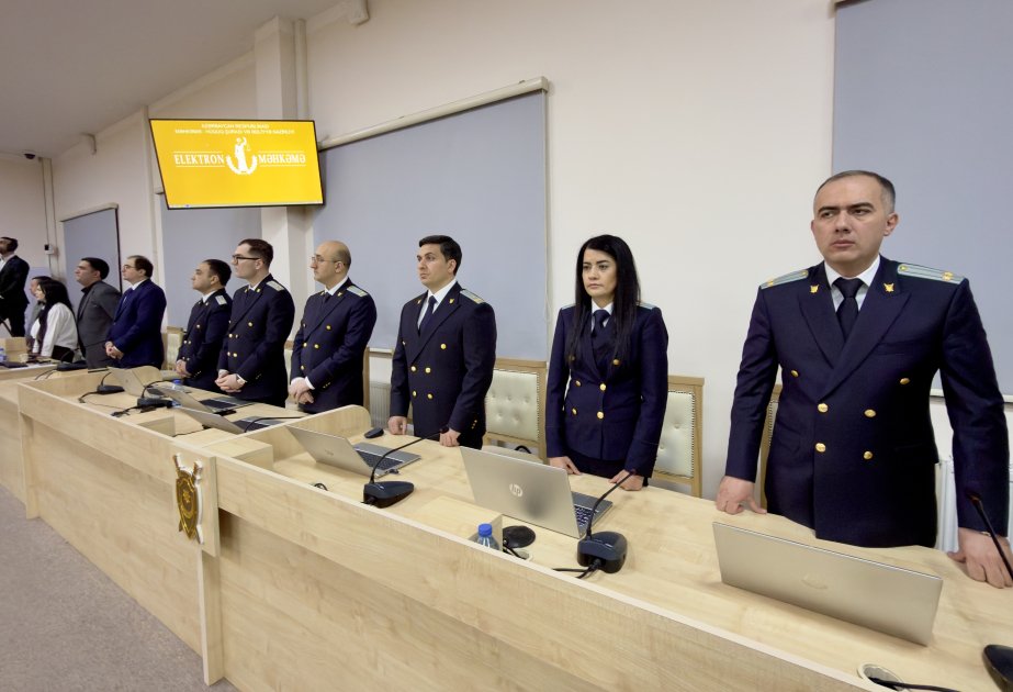 Prosecutors standing during court session