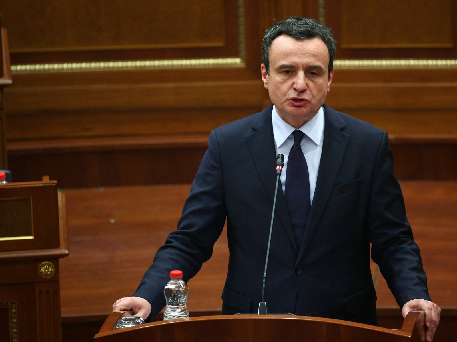 Kurti speaking at parliament podium