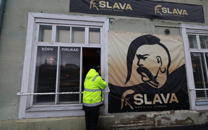 Slava Ukrainian restaurant storefront in Tallinn showing aftermath of arson attack