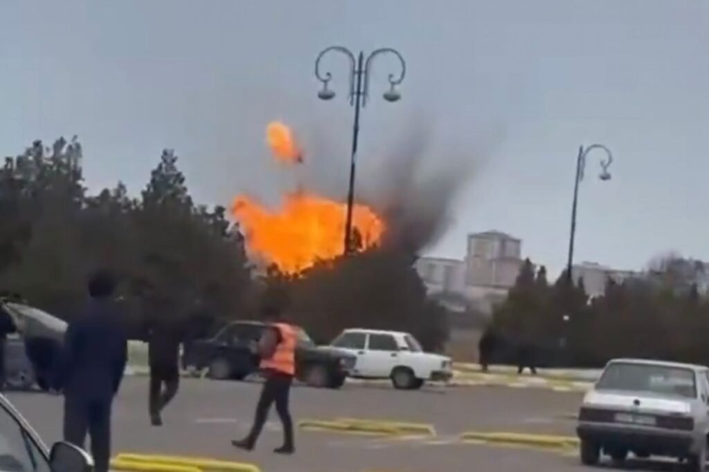 Explosion with flames visible at airport parking lot, people fleeing the scene. Фото: OC Media