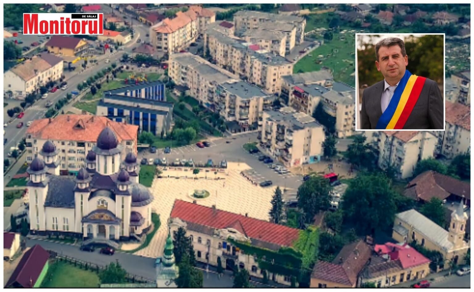 Школы румынского Жибоу получили цифровое оборудование на €560 тыс. Панорамный аэрофотоснимок города Жибоу, жудец Сэлаж, с портретом мэра Дана Гиурко в трёхцветной ленте