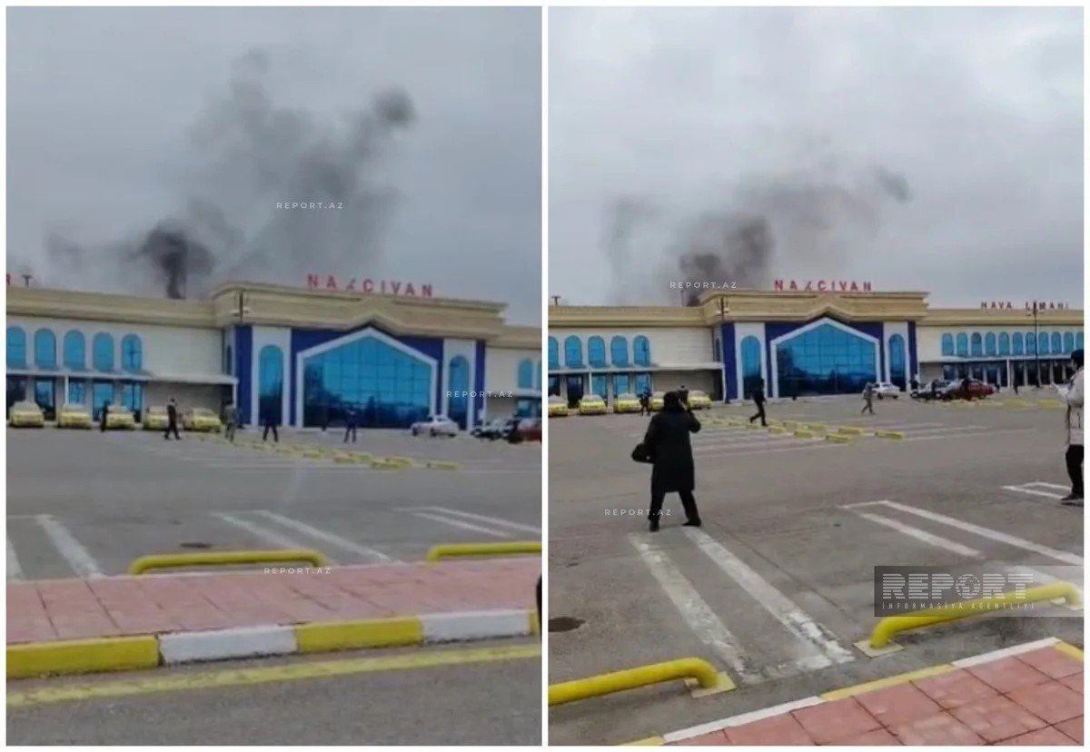 Терминал аэропорта Нахичевань с поднимающимися столбами дыма, эвакуация людей. Фото: Report News Agency