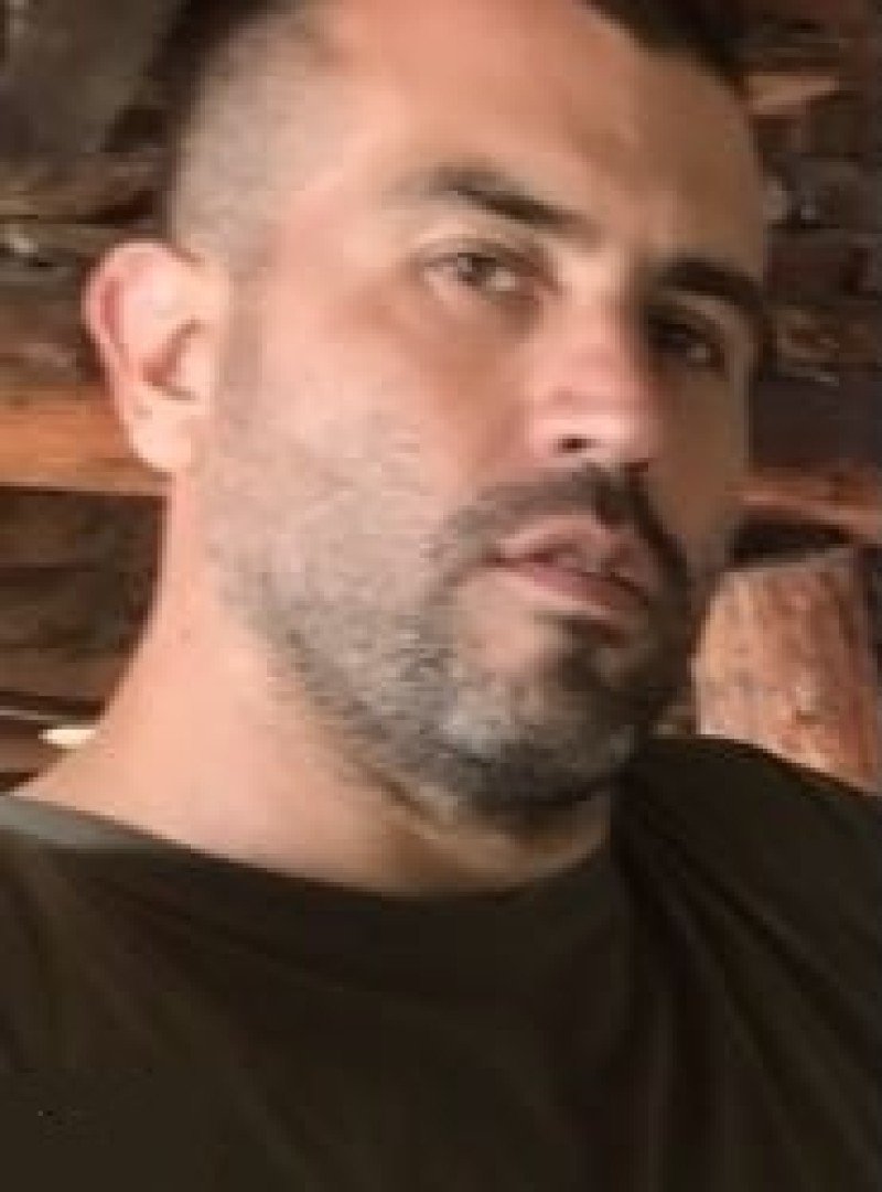 Portrait of middle-aged man with grey beard and dark hair. Фото: OCCRP