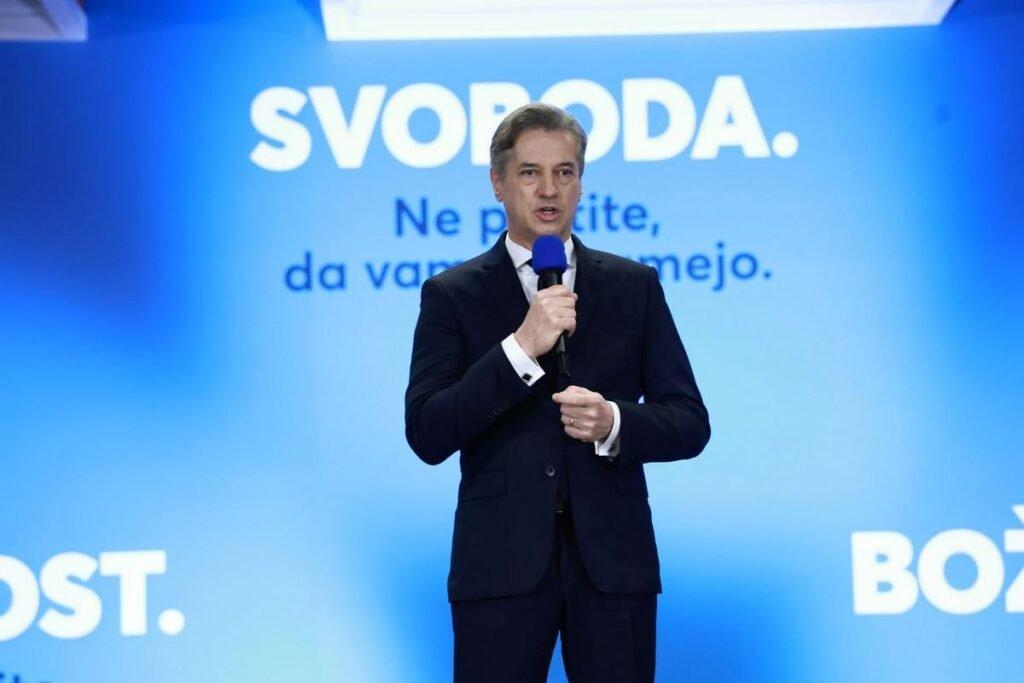 Premier Robert Golob speaking at Svoboda party event