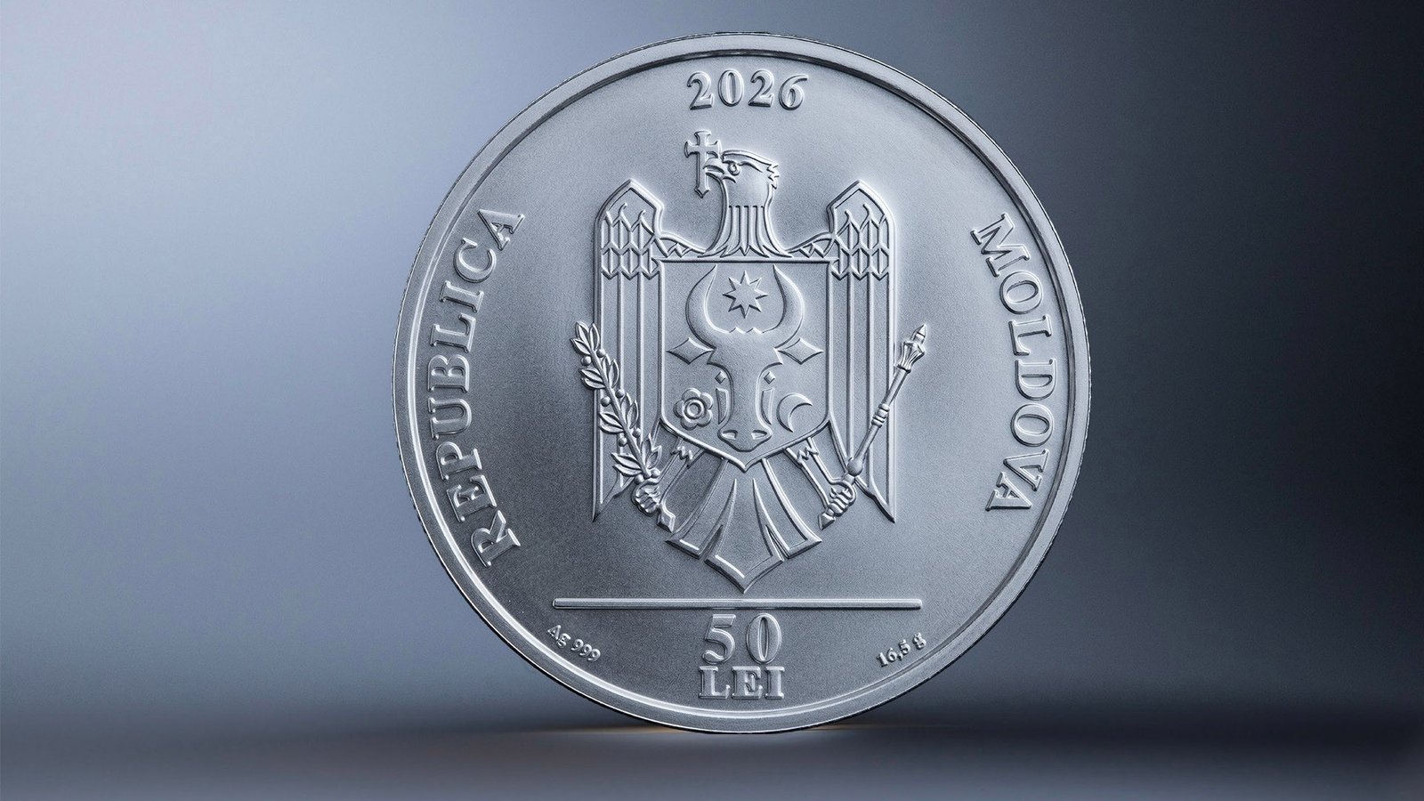 Аверс памятной монеты «Элеонора Романеску — 100 лет со дня рождения»: центральное изображение государственного герба Республики Молдова, год эмиссии «2026», номинал «50 LEI» и проба «Ag 999», по окружности — надпись «REPUBLICA MOLDOVA»