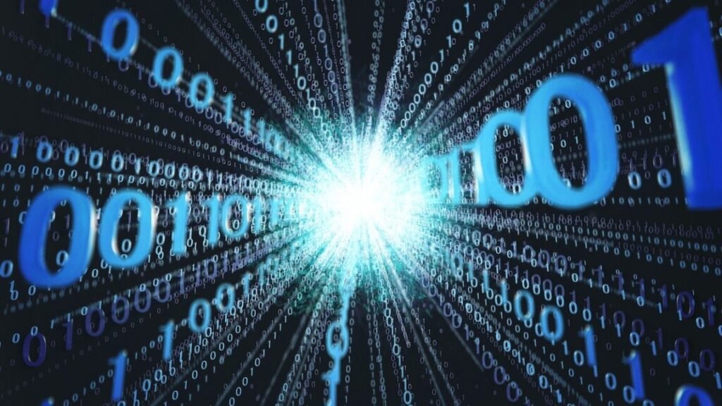 Потоки двоичных цифр сходятся к вспышке света на чёрном фоне