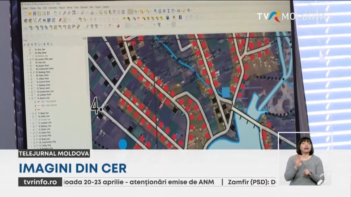 Экран ГИС-программы с кадастровыми слоями на аэроснимке посёлка в Молдове