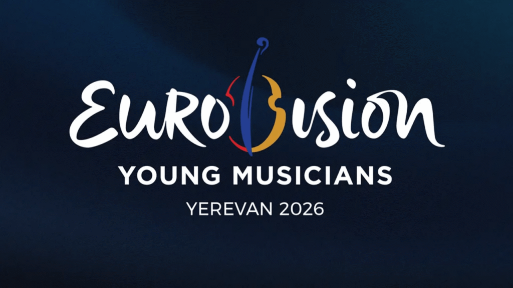 В Ереван приехали финалисты Eurovision Young Musicians 2026 Официальный логотип конкурса Eurovision Young Musicians 2026 со стилизованной скрипкой в фирменных цветах на тёмно-синем фоне и подписью «Yerevan 2026»